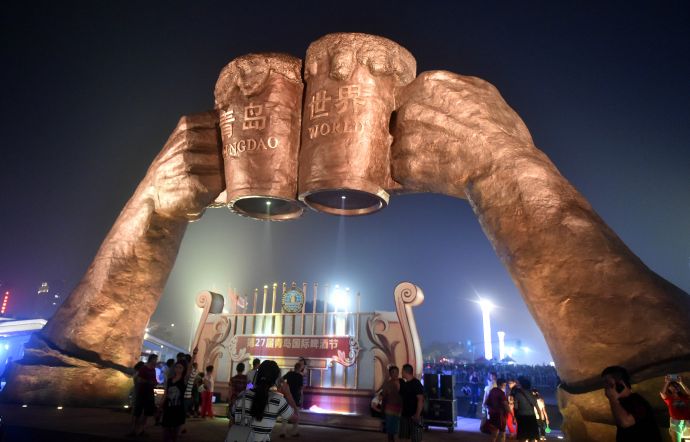 People attend the 27th Qingdao International Beer Festival in Qingdao, Shandong Province, Aug. 4. 2017.